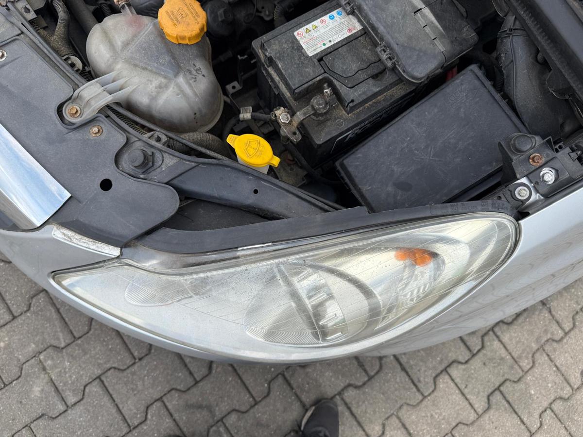 Opel Corsa D original Scheinwerfer links Halogen 93189357 BJ08